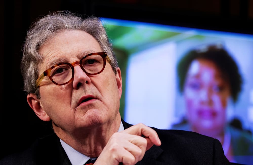 Sen. John Kennedy, R-La., listens as Stacey Abrams testifies remotely during a Senate Judiciary Committee hearing on voting rights on Capitol Hill on April 20, 2021.