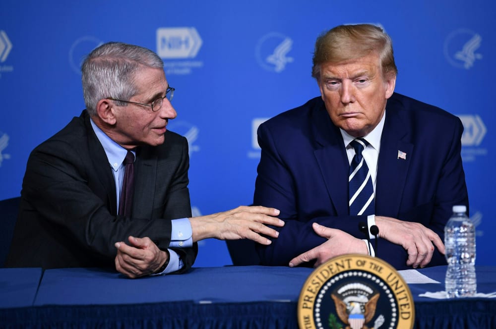 Image: President Donald Trump and Anthony Fauci, director of the NIH National Institute of Allergy and Infectious Diseases attend a meeting at the National Institutes of Health in Bethesda, Maryland