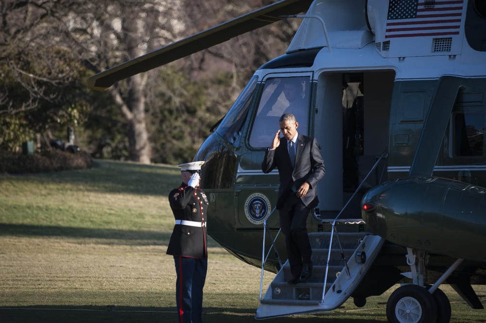 President Barack Obama arrives on the South Lawn of the White House onboard Marine 1 March 18, 2015 in Washington, DC. (Photo by Pete Marovich-Pool/Getty)