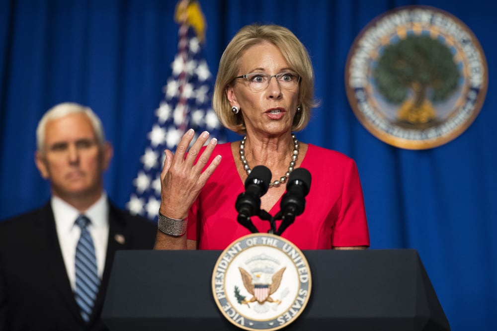 Image: Mike Pence, Betsy DeVos