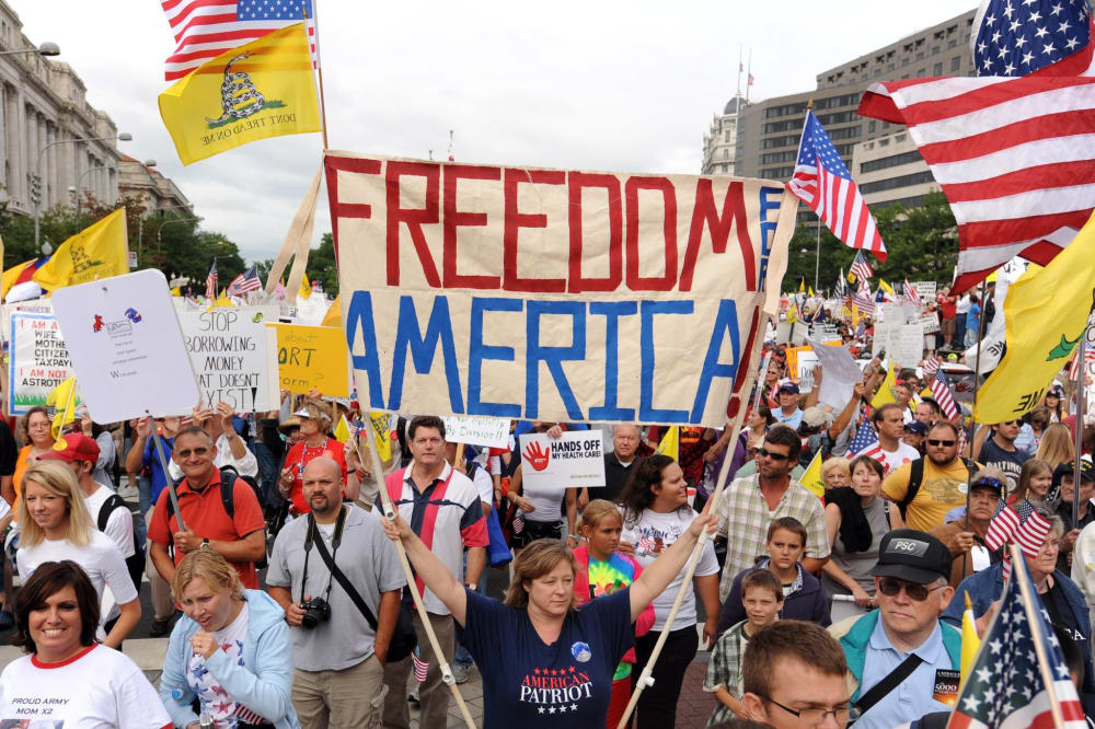 Image: Thousands of people join a march and demonstration to protest health care reform proposed by US President Barack Obama