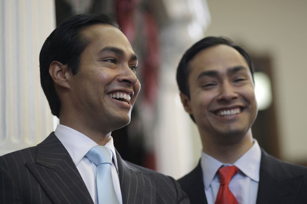 Julian Castro, left, mayor-elect of San Antonio, pauses during a visit with his brother, Rep. Joaquin Castro, D-San Antonio, right, in the Texas House of Representatives Wednesday, May 27, 2009, in Austin, Texas. (AP Photo/Harry Cabluck)