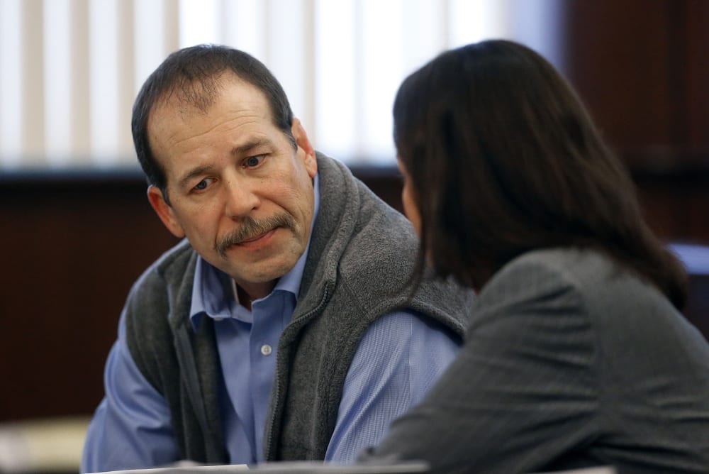 Theodore Wafer listens to his attorney Cheryl Carpenter while appearing at his preliminary examination before District Court Judge David Turfe in Dearborn Heights, Mich., Dec. 18, 2013.