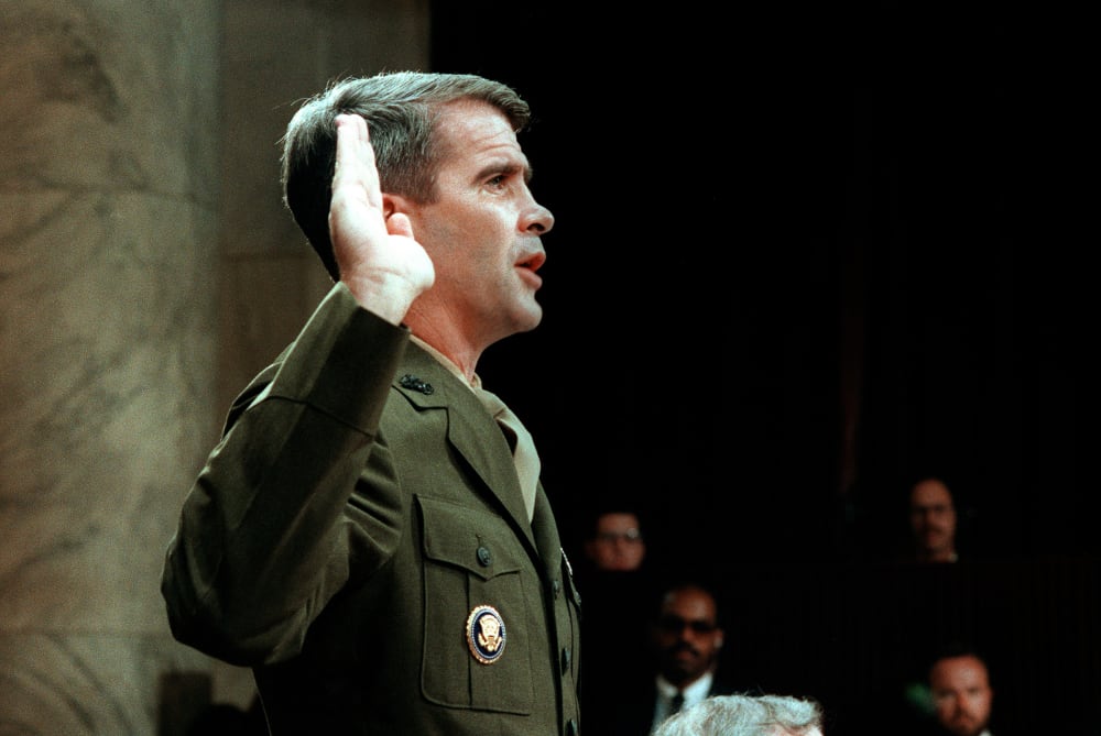 Lieutenant-Colonel Oliver North is sworn in July 7, 1987 before the House and Senate Foreign Affairs Committee hearing in Washington, D.C. on arms sales to Iran and diversion of profits to Nicaraguan Contra rebels.