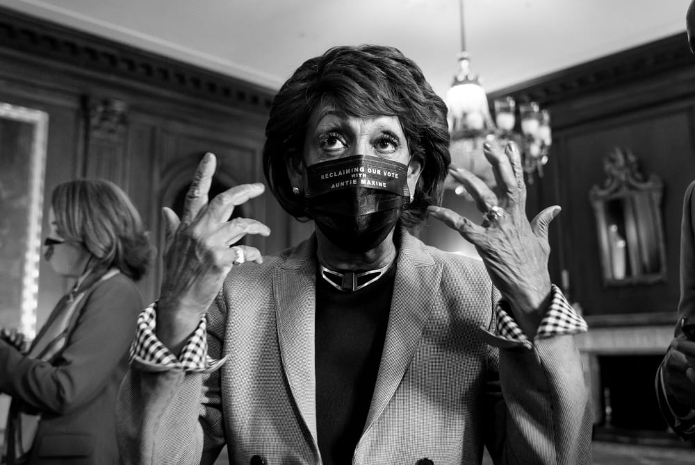 Image: Rep. Maxine Waters, D-Calif., speaks as she waits for the verdict in the murder trial of former Minneapolis police officer Derek Chauvin on Capitol Hill on April 20, 2021.