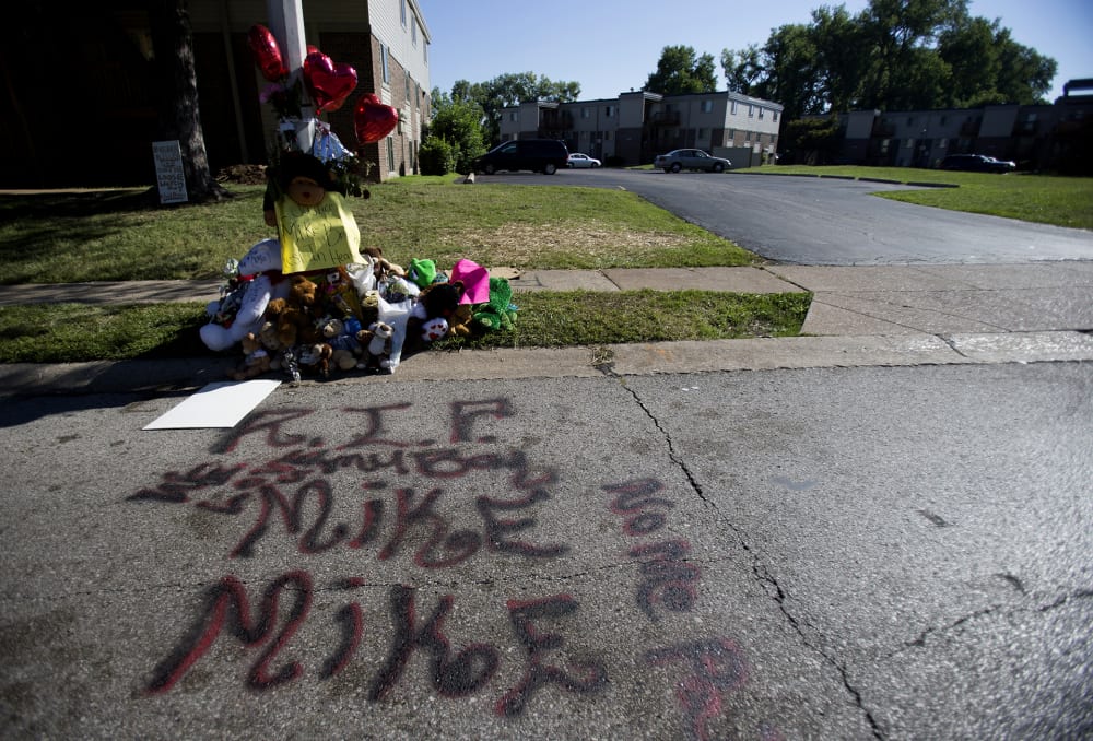 A makeshift memorial is pictured near where Michael Brown was shot to death in Ferguson, Mo., on August 12, 2014.