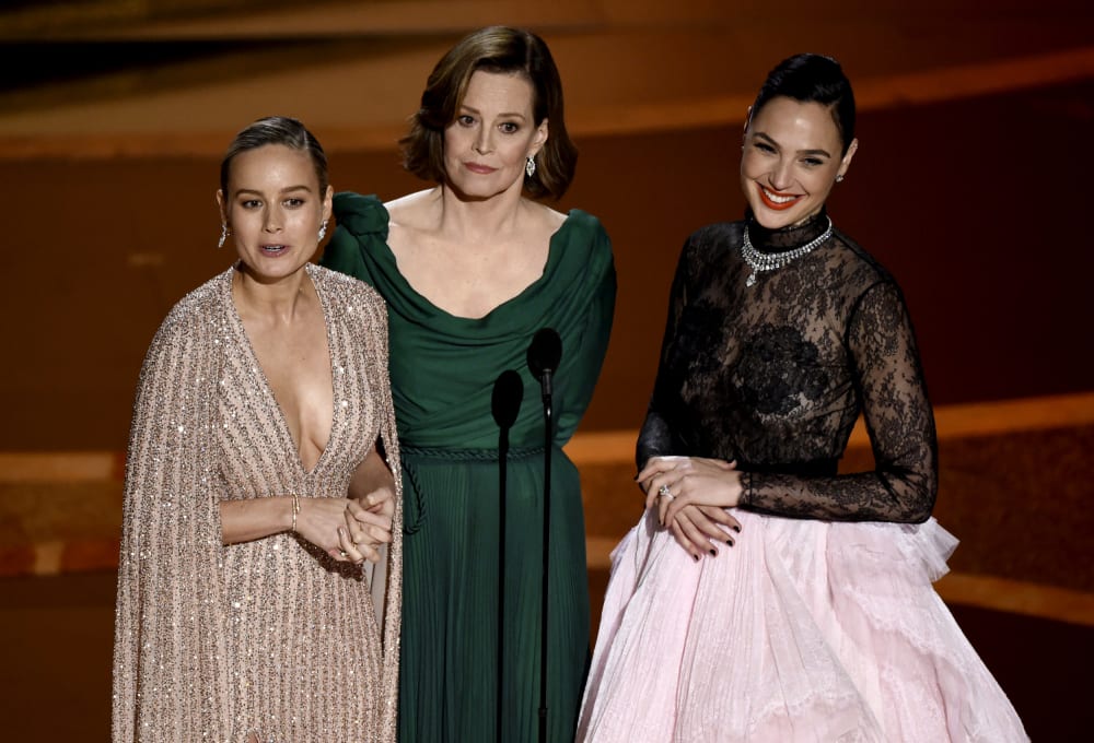 Image: Brie Larson, Sigourney Weaver and Gal Gadot speak at the 92nd Annual Academy Awards on Feb. 9, 2020.