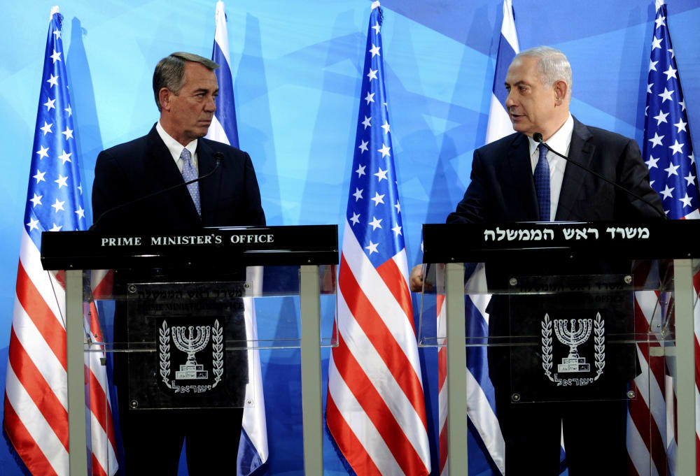 Israeli Prime Minister Benjamin Netanyahu looks at the Speaker of the US House of Representatives, John Boehner, as they deliver statements in Jerusalem April 1, 2015. (Photo by Debbie Hill/Reuters)