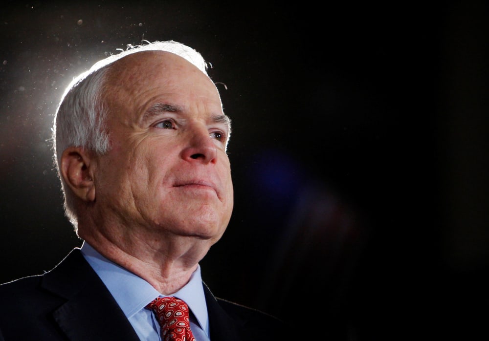 Image: FILE PHOTO - U.S. Republican presidential nominee Senator John McCain (R-AZ) listens during rally in Denver
