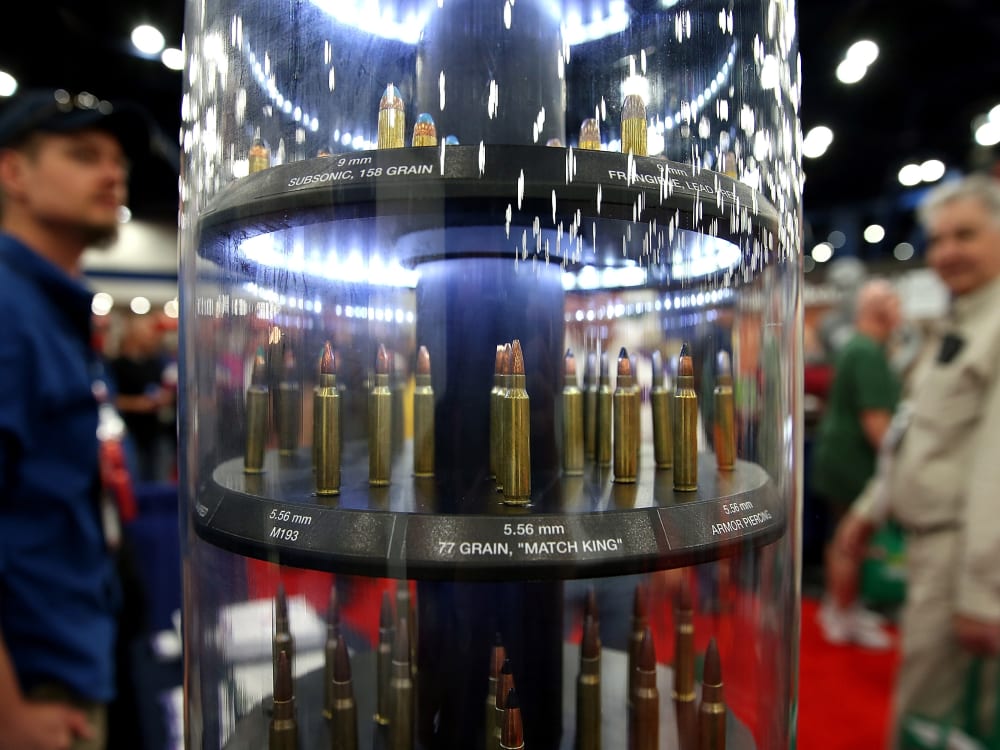 Attendees look at a display of ammunition during the 2013 NRA Annual Meeting and Exhibits at the George R. Brown Convention Center on May 3, 2013 in Houston, Texas. More than 70,000 people are expected to attend the NRA's 3-day annual meeting that...