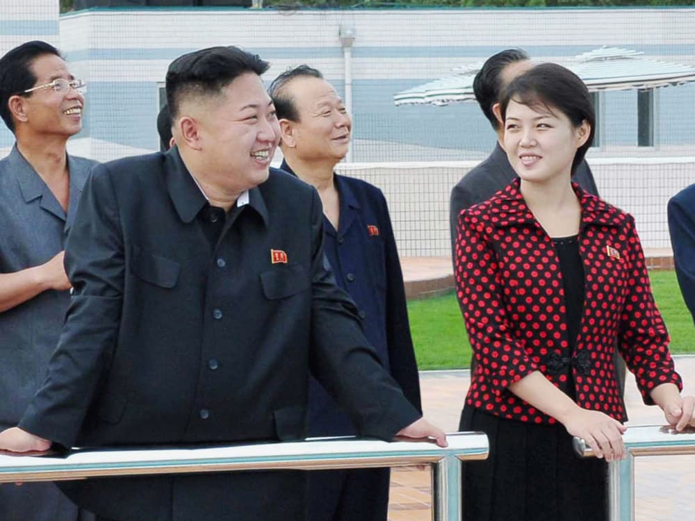 File Photo: North Korean leader Kim Jong-Un (2nd L) and an unidentified woman visit the Rungna People's Pleasure Ground, which is nearing completion, in Pyongyang in this undated picture released by the North's KCNA on July 25, 2012. (Photo by Reuters...