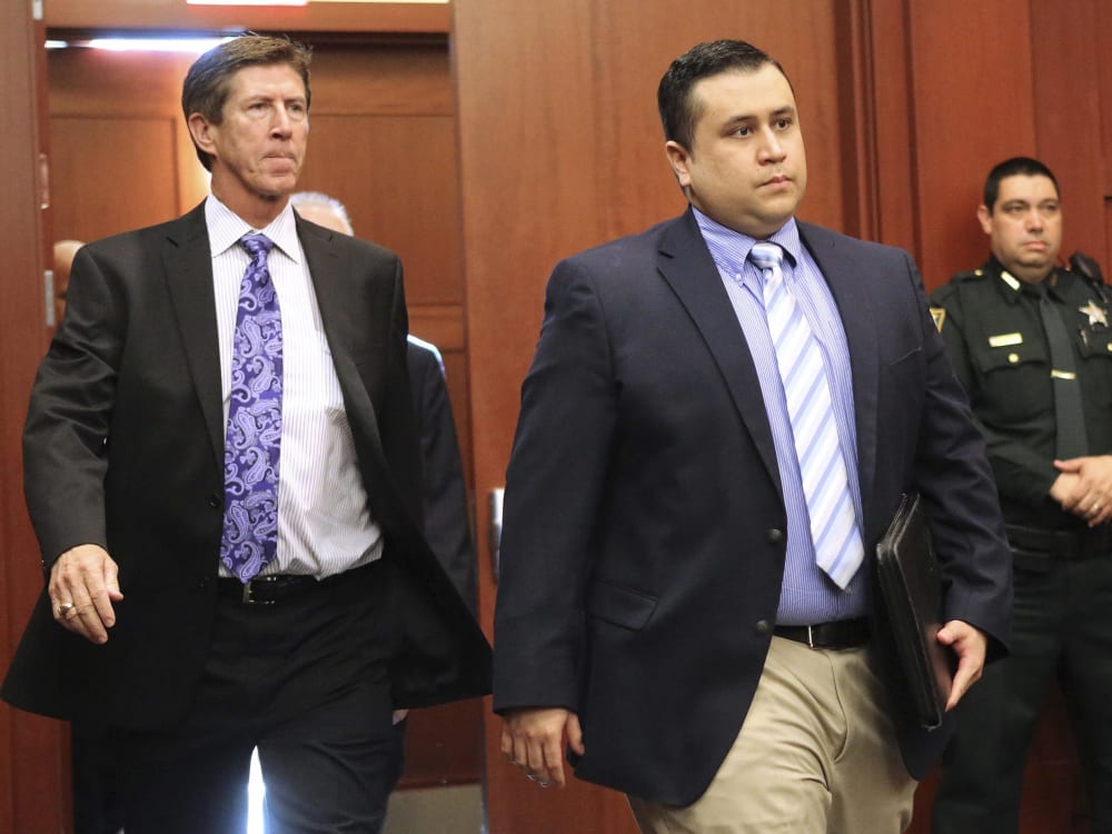 George Zimmerman arrives with his lead counsel, Mark O'Mara (L) for a hearing in Seminole circuit court in Sanford, Florida in this file photo taken February 5, 2013. Photo by Joe Burbank/Pool/Reuters