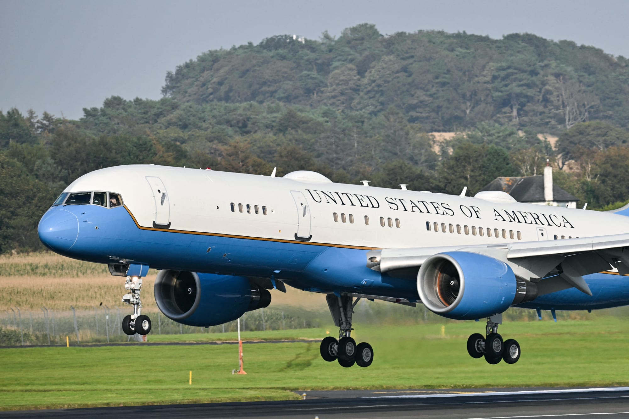 The Air Force Two plane lands on the tarmac