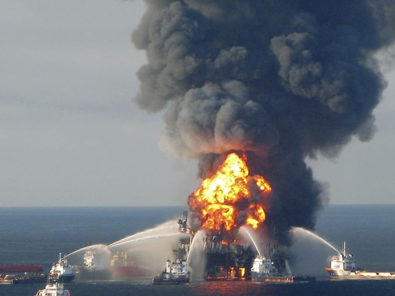 File - Fire boats battle the blazing remnants of the off shore oil rig Deepwater Horizon, off Louisiana, in this April 21, 2010 handout file photo. (File photo U.S. Coast Guard/Handout/Reuters)