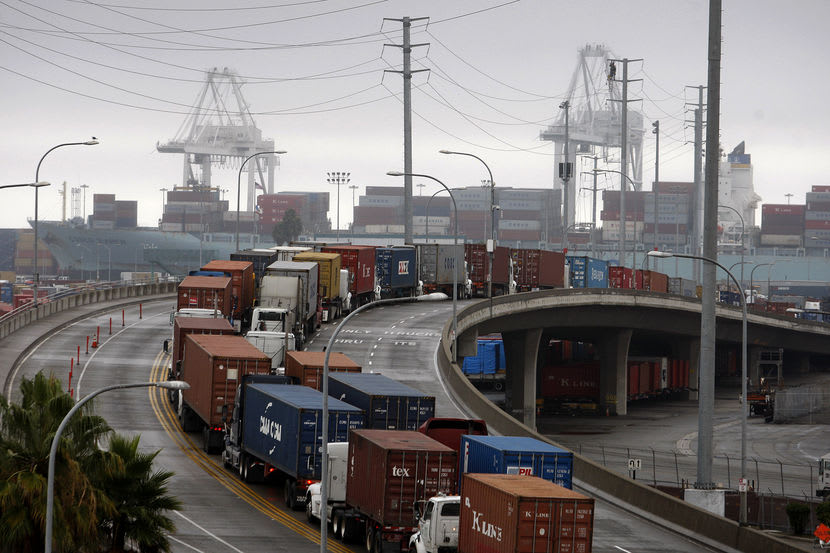 Shipping container trucks sit in traffic at the seaport complex in the nation on November 29, 2012 in Long Beach, Calif.