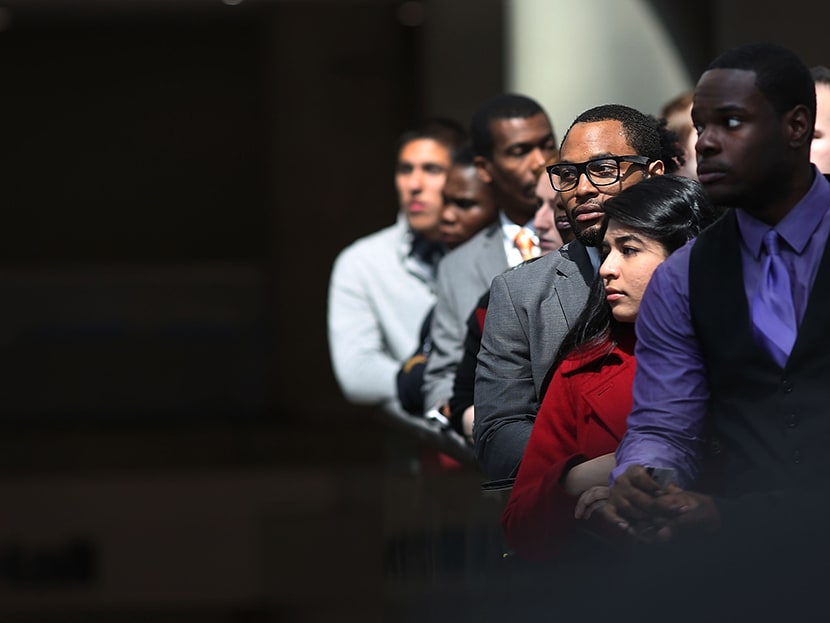 Job seekers wait in line to meet with employers at the 25th Annual CUNY big Apple Job and Internship Fair at the Jacob Javits Convention Center on April 26, 2013 in New York City. (Photo by Spencer Platt/Getty Images)