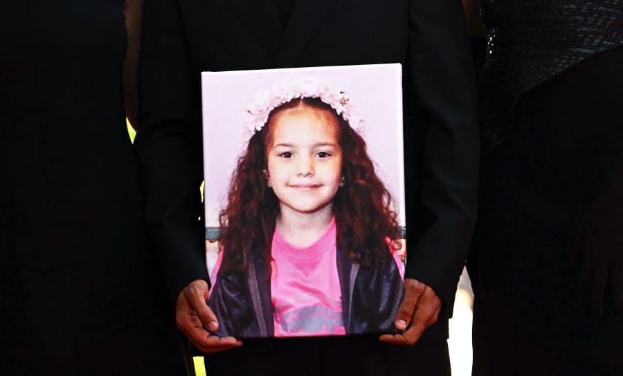 Guests hold a portrait of Hind Rajab during the red carpet for the movie "The Voice of Hind Rajab" presented at the 82nd International Venice Film Festival on Sept. 3, 2025.