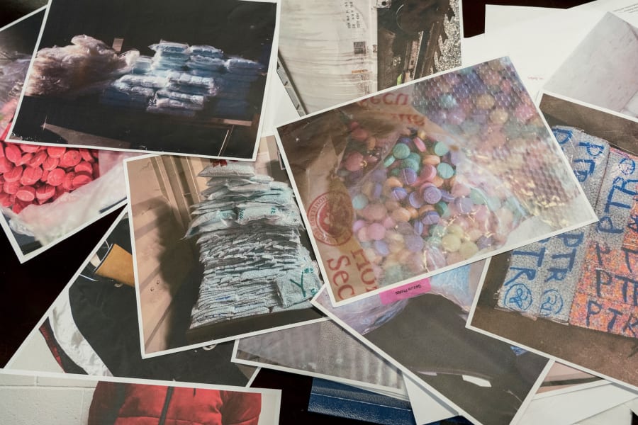 Photographs of seized fentanyl, weapons, and other illicit drugs presented at The Nogales-Mariposa Port of Entry in Nogales, A.Z., on Feb. 28, 2023.
