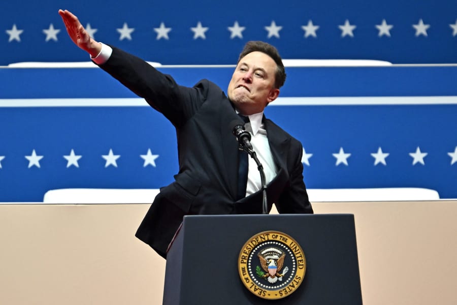 Tesla and SpaceX CEO Elon Musk gestures as he speaks during the inaugural parade.