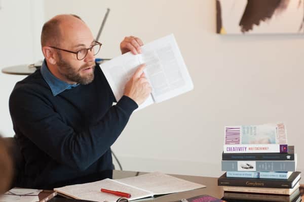 Chris with script.png