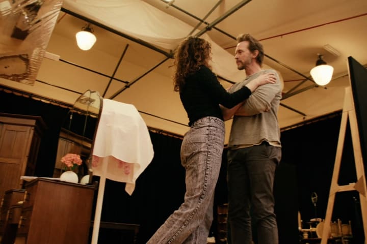 Artwork for Rebecca in rehearsal