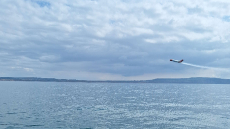 The OSRL Boeing 727 is seen conducting a dispersant application over the sea as part of the Surface Dispersants Exercise 2024. This crucial aspect of the drill tested the effectiveness of dispersant spraying in offshore spill response scenarios.