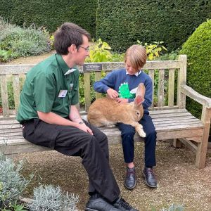 One of the Exotic Explorers volunteers helping out at a wedding with Jean Luc, our Continental Giant Rabbit