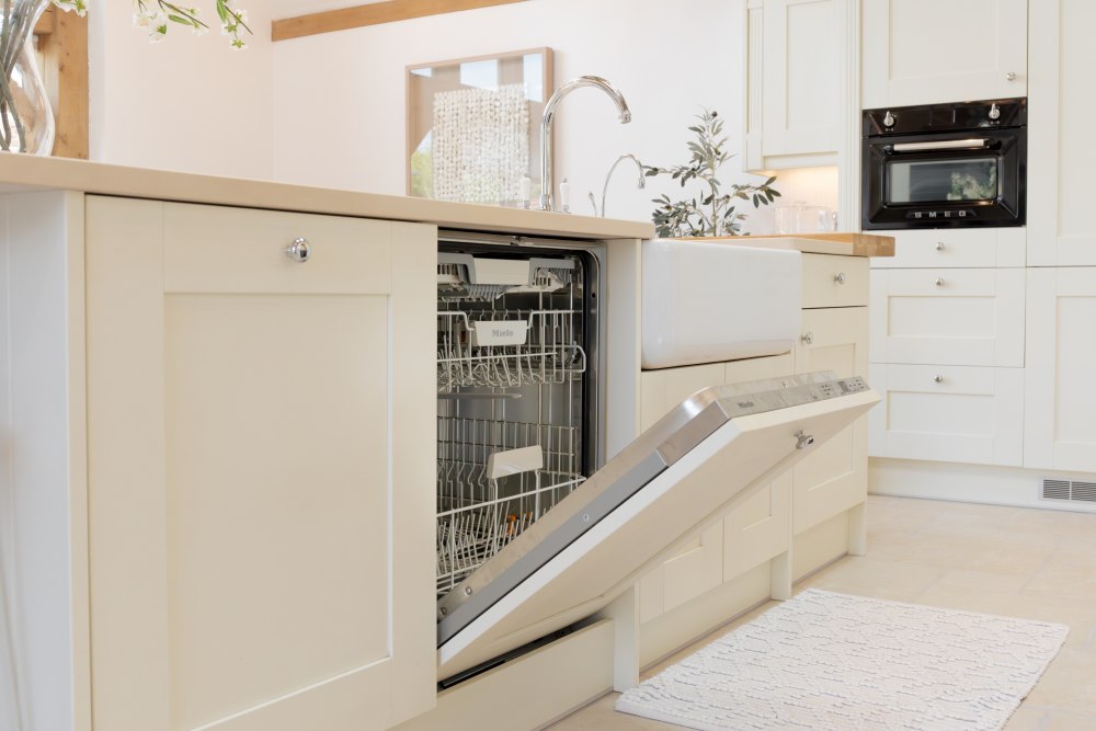 Slim dishwasher integrated into modern small kitchen