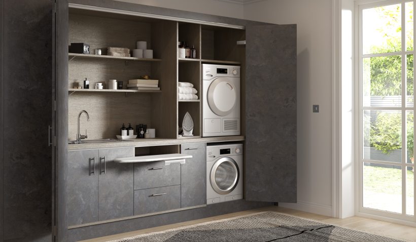 Hero shot of the Hideaway Elements Utility Kitchen in Metallic Night featuring - ironing board, washing machine and dryer