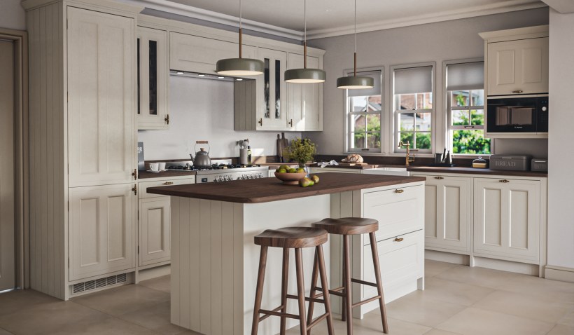 Hero shot of the Inframe Country Ermine Kitchen in Cream Matt featuring kitchen island, pendent lighting and stool seating