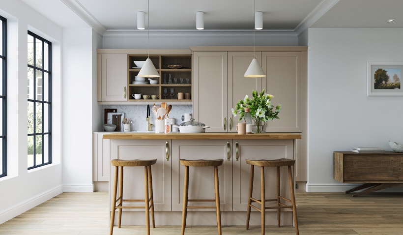 Infinity Shaker Chelsea Cashmere kitchen with central island, bar stools, and shaker cabinetry in a soft cashmere finish.