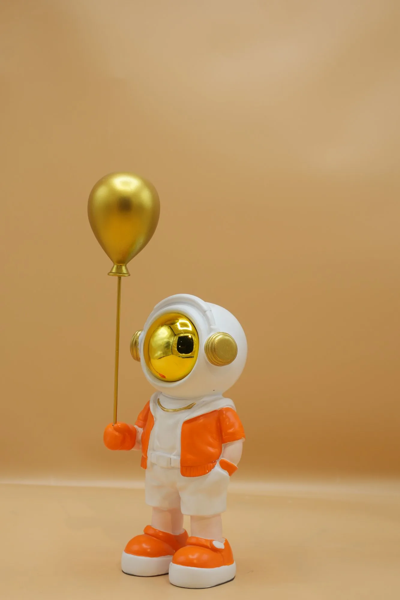 Astronaut with Golden Balloon Decorative Figurine