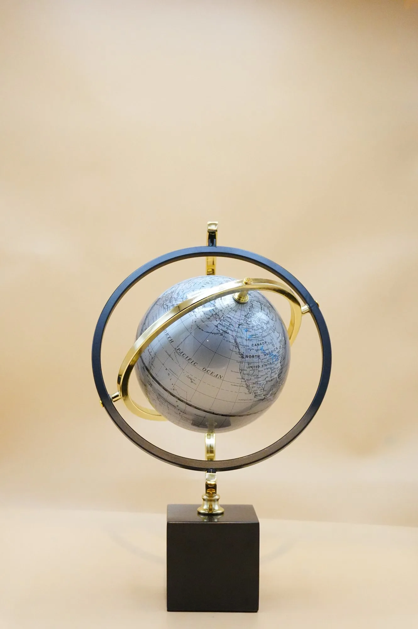World Globe with Gold Rotating Frame