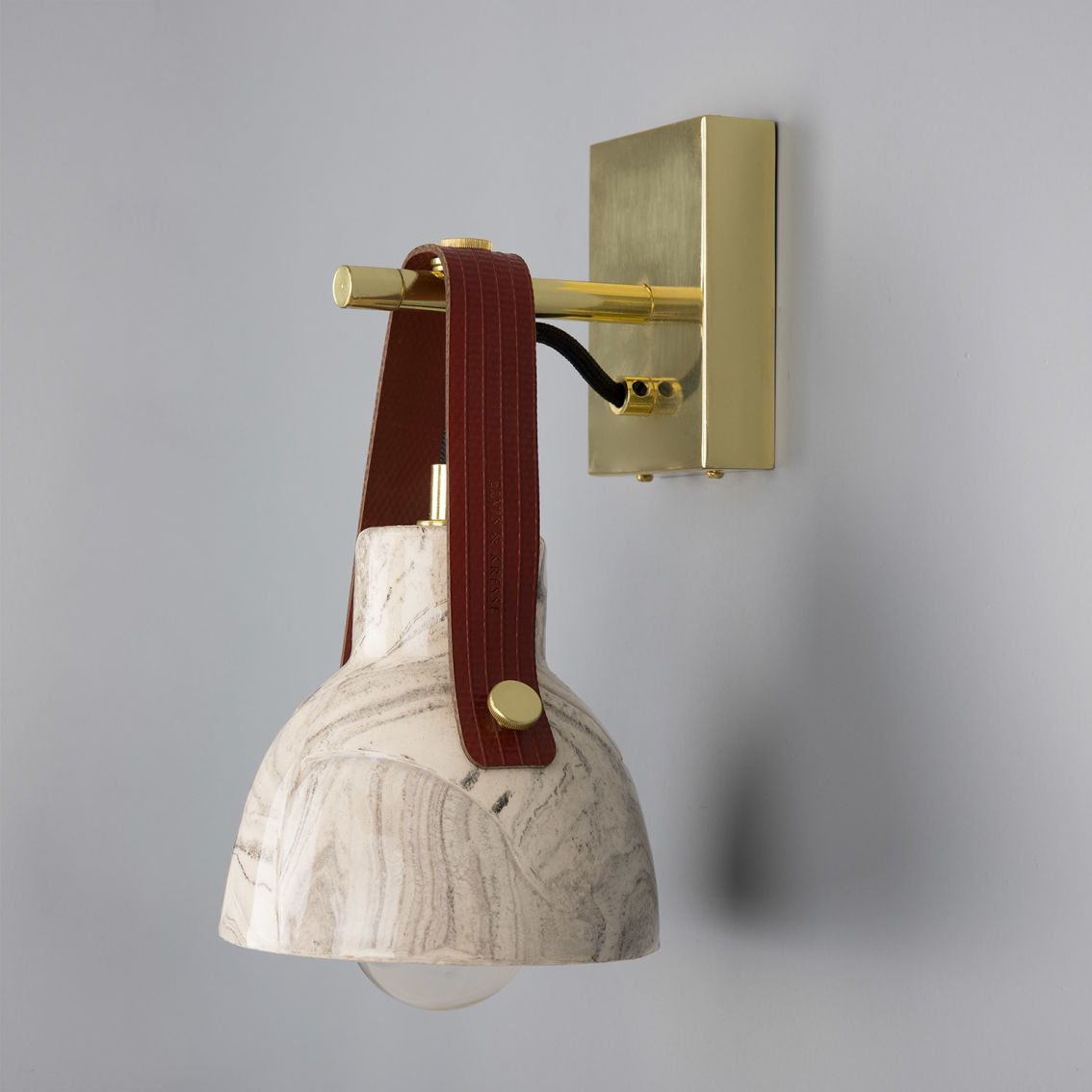 Nagi Marbled Ceramic Wall Light with Rescued Fire-Hose Strap main product photo