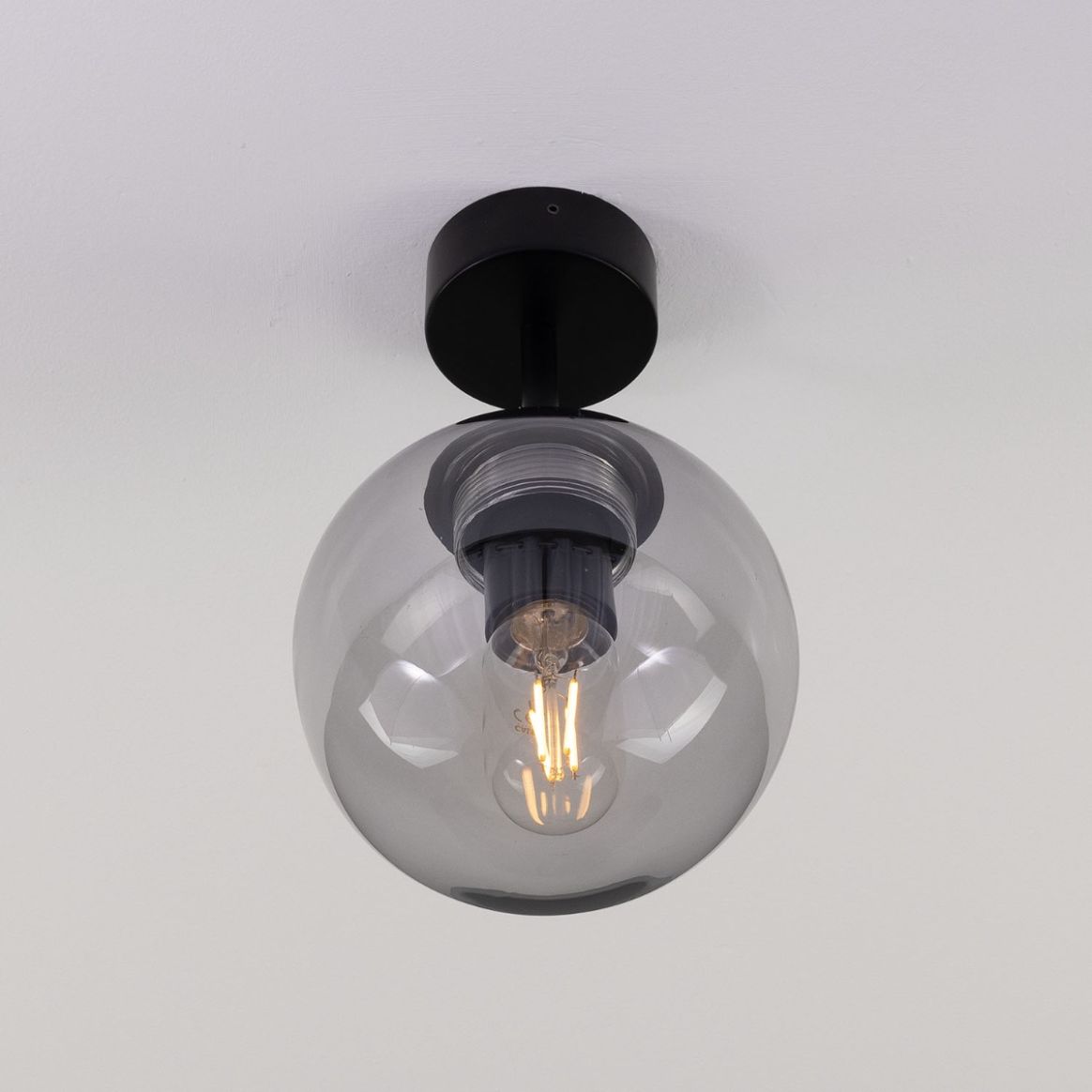 Minimalist globe outlet ceiling light