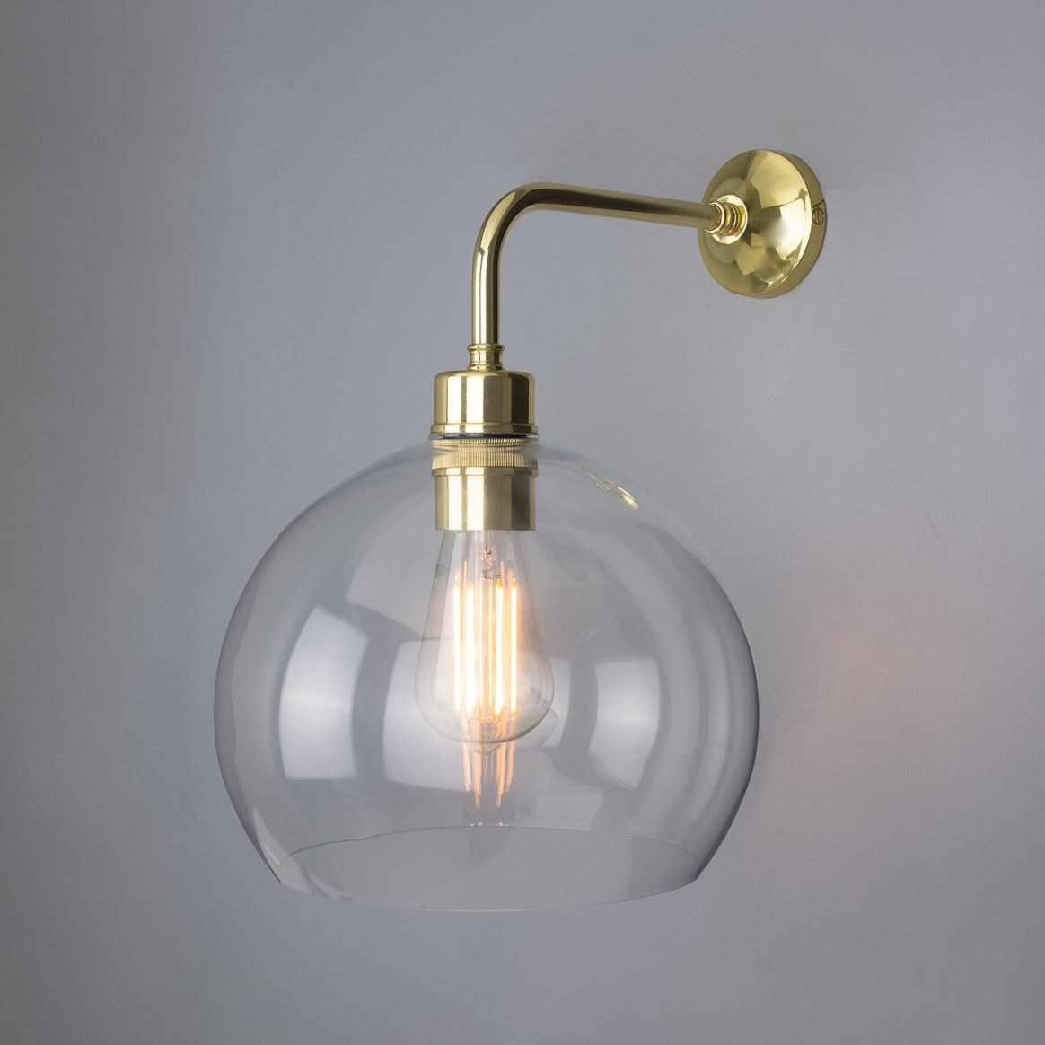 Glass globe shop sconce