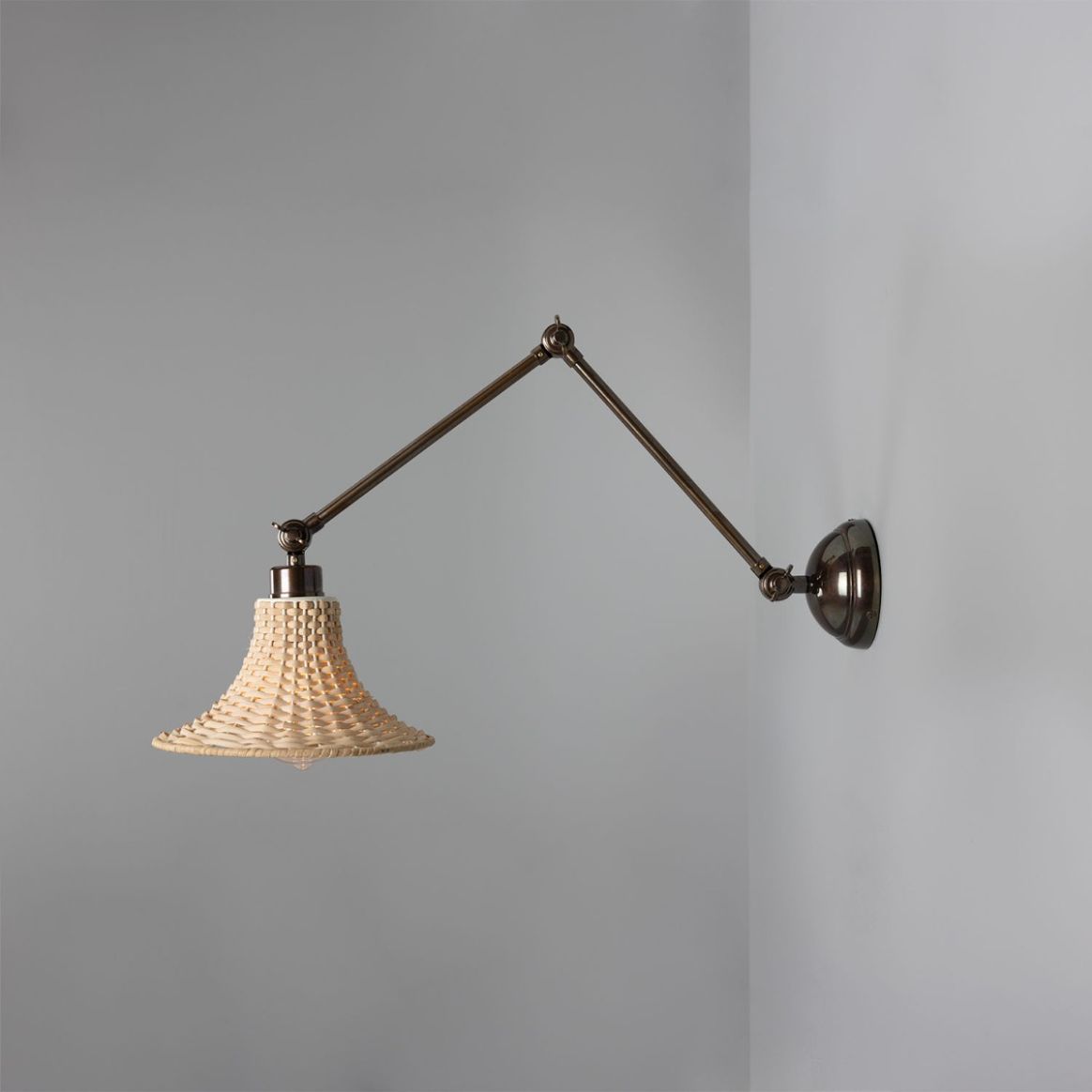 Savannah Adjustable Wall Light with Small Bell Rattan Shade