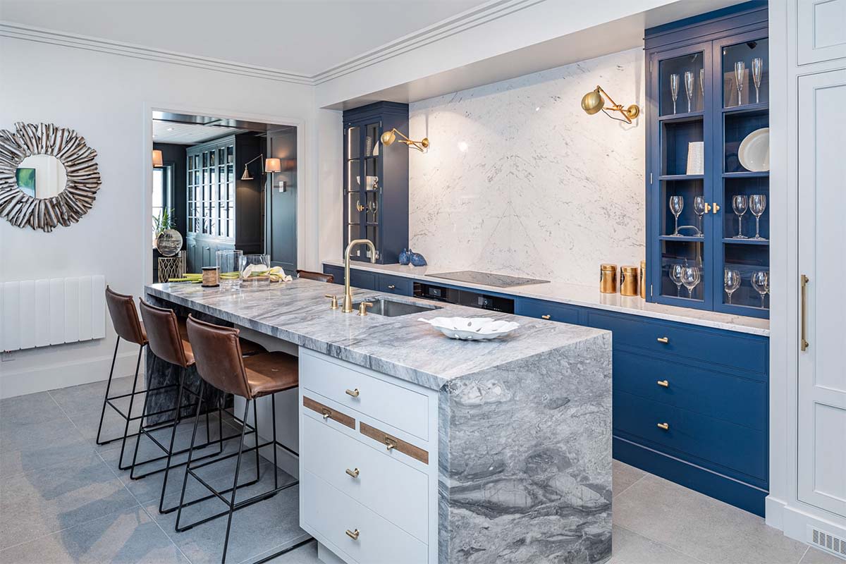 wall sconces above kitchen windows