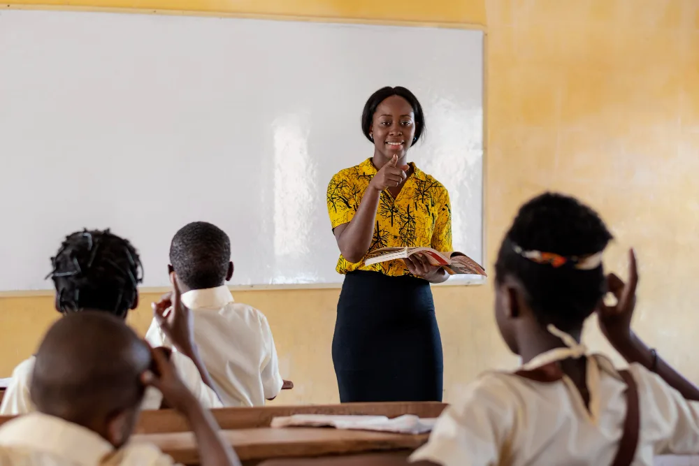 A teacher leading a classroom of students