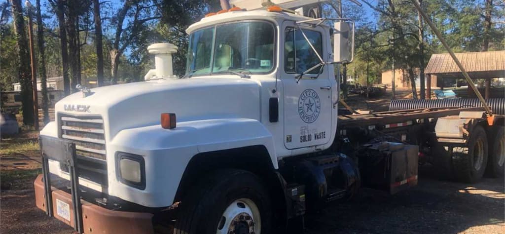 2000 Mack Roll-Off Truck