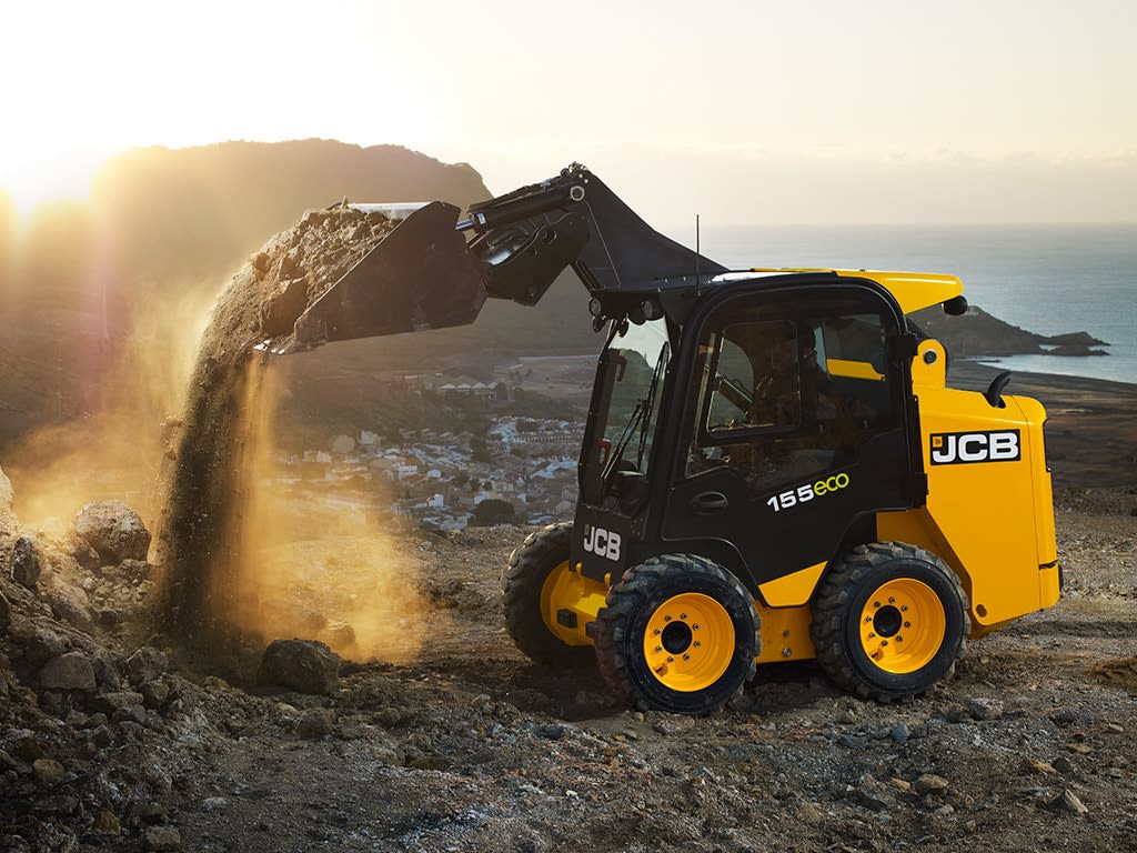 Yellow skid steer loader, good for landscaping and which you can get without having to pay too much.