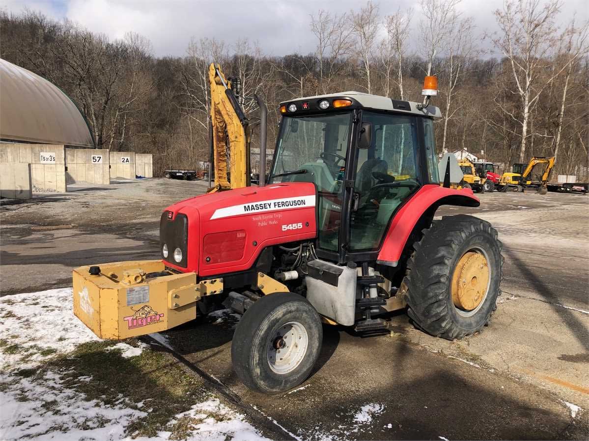 2007 Massey Ferguson 5455 with a Tiger side cutting mower, displaying Massey Ferguson legal logo.