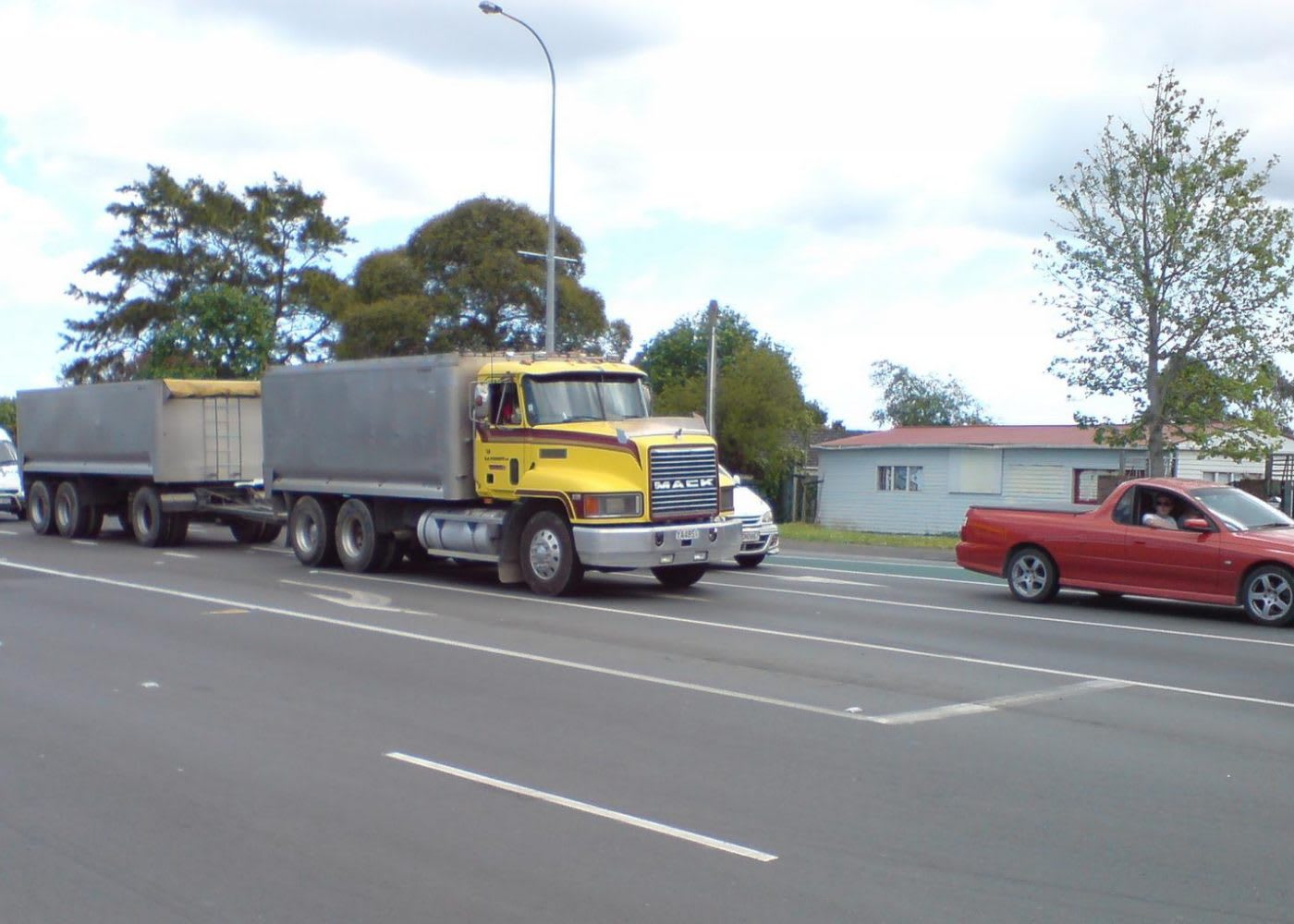 Yellow Mack transfer dump truck