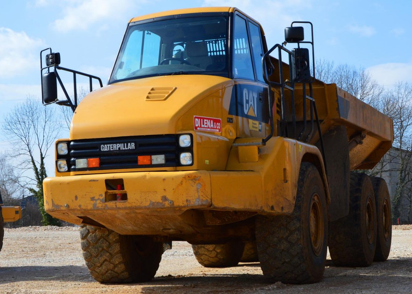 Yellow articulated dump truck