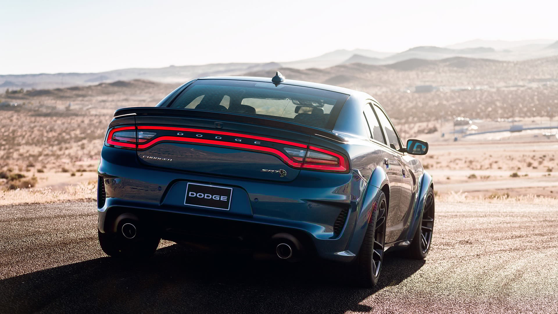 2020 Dodge Charger SRT Hellcat driving in the desert.