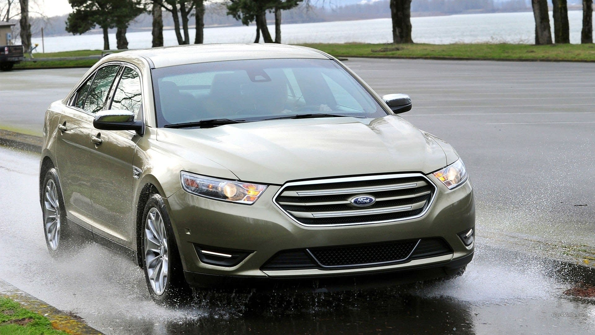 Gold car, among the newer models of Ford Taurus vehicles on the market and considered a reliable vehicle among drivers.