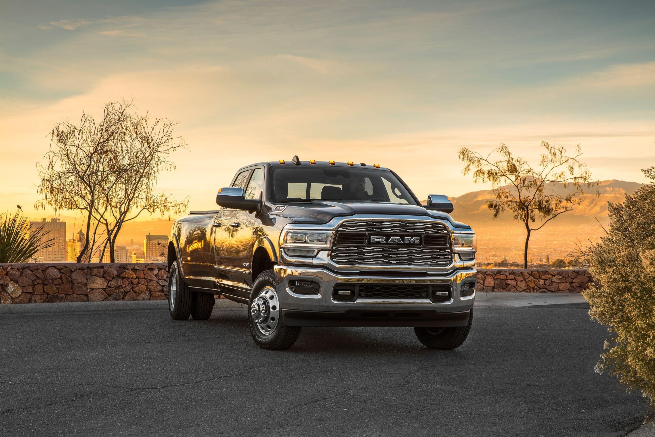 Ram 3500, using diesel fuel, parked at sunset on pavement.