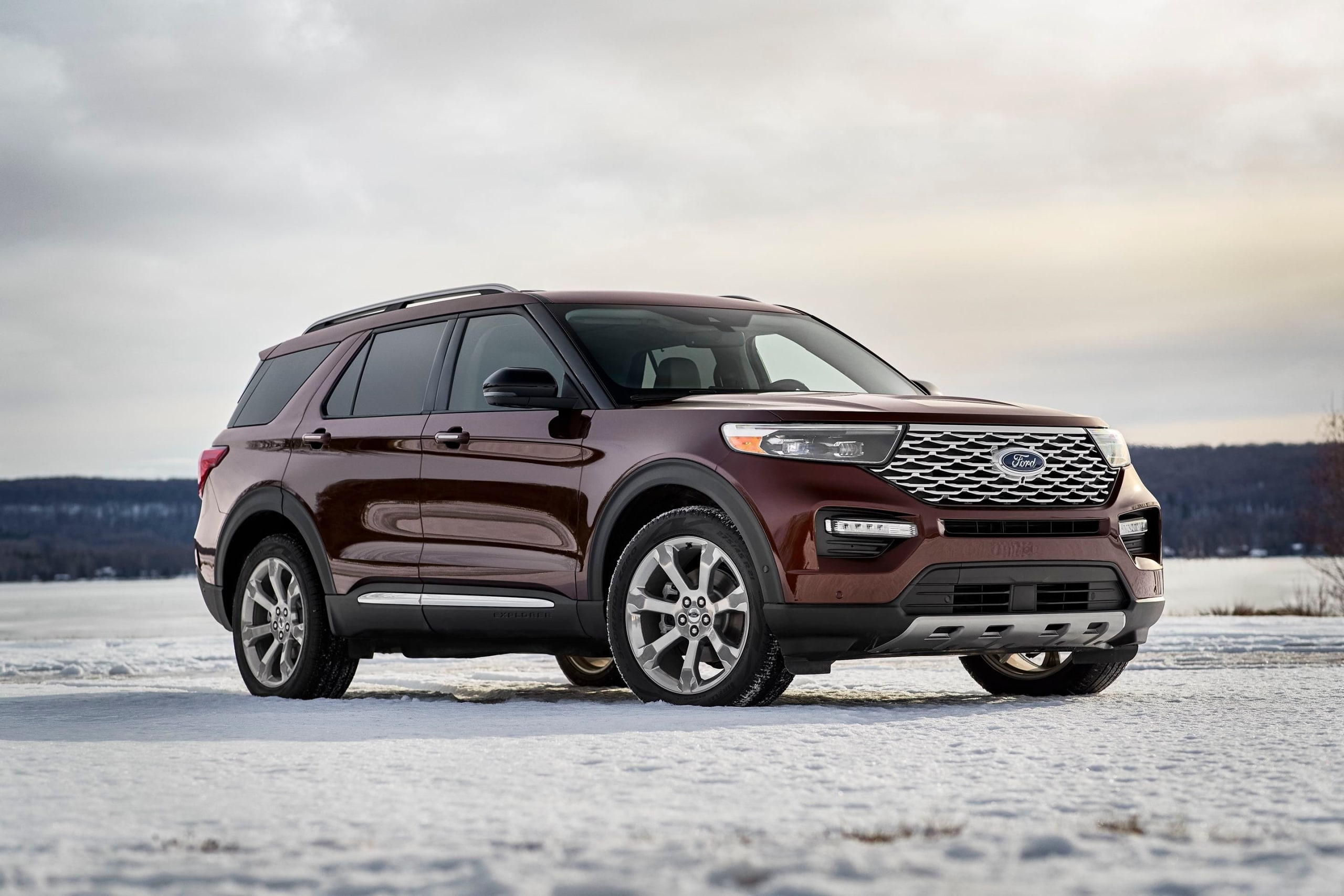 Ford Explorer SUV parked on ice and snow, suitable for the adventure driver and offering keyless entry.