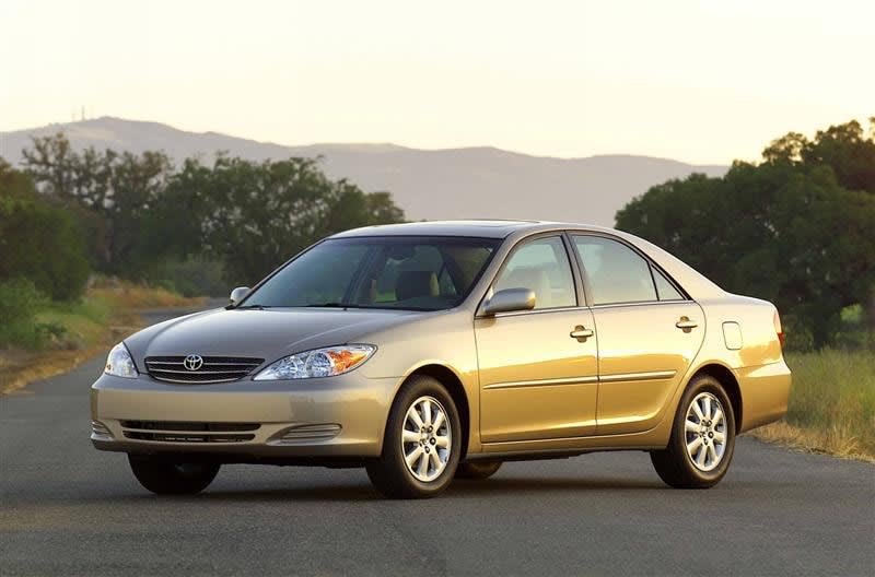 2003 Toyota Camry car parked on a road.