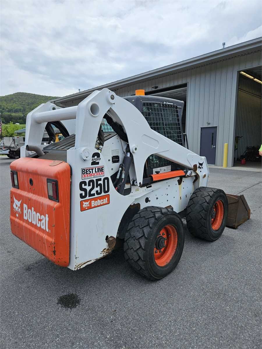 2009 Bobcat S250 Skid Steer Loader (heavy equipment) with accessories for sale on Municibid, Harris Township for an extended period.